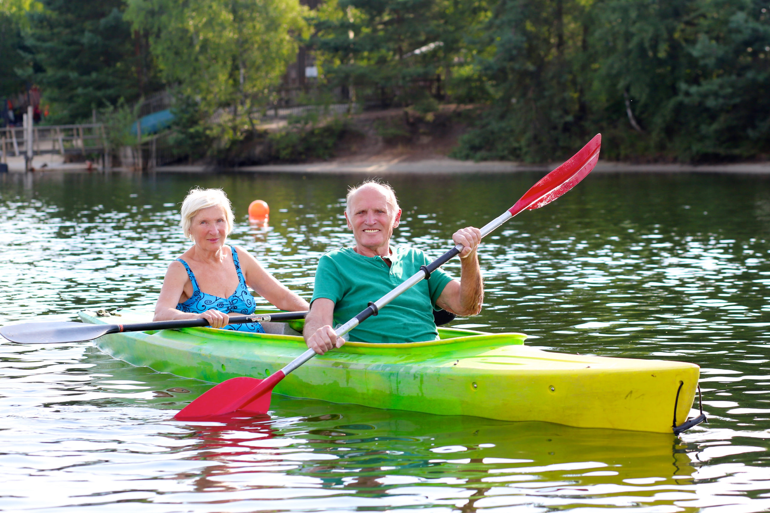 Senior Couple Kayaking on the River