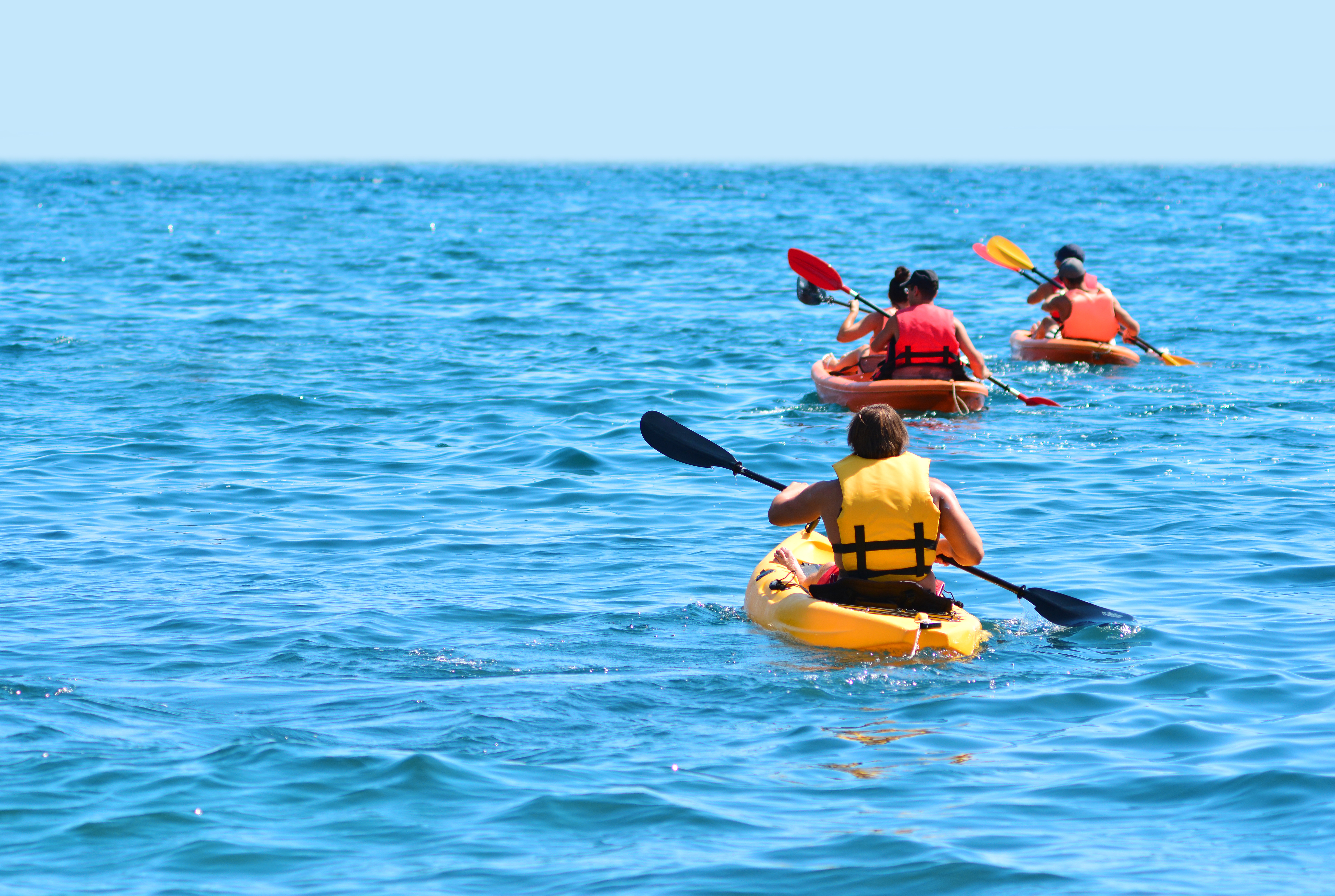 Group of Kayaks in Sea