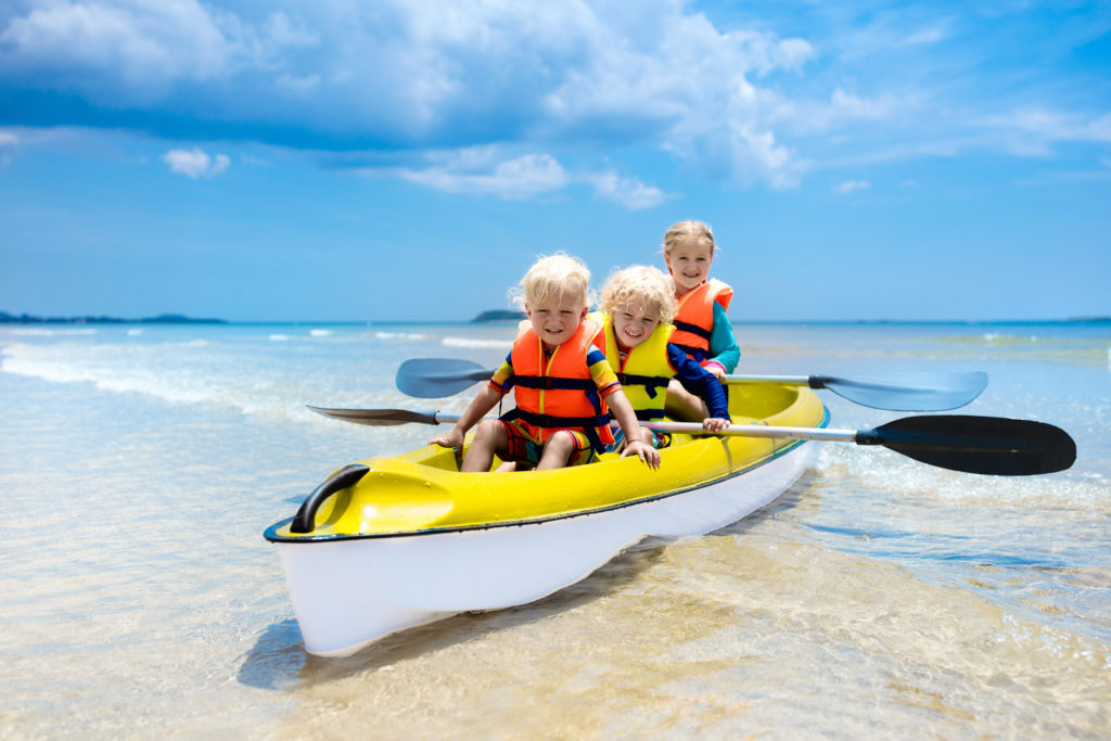 Kids Kayaking in Ocean