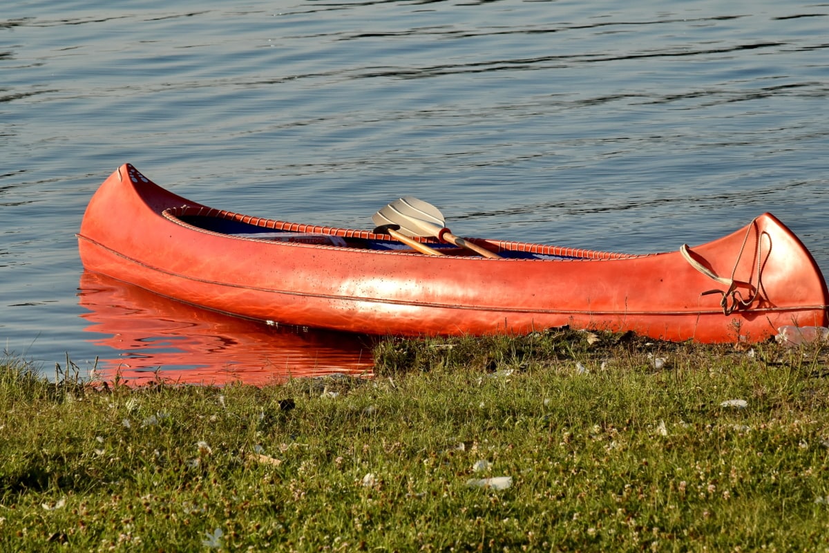 Red Canoe Near the Lake